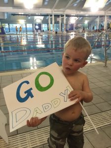 Henry Atherton cheering on his dad Gavin